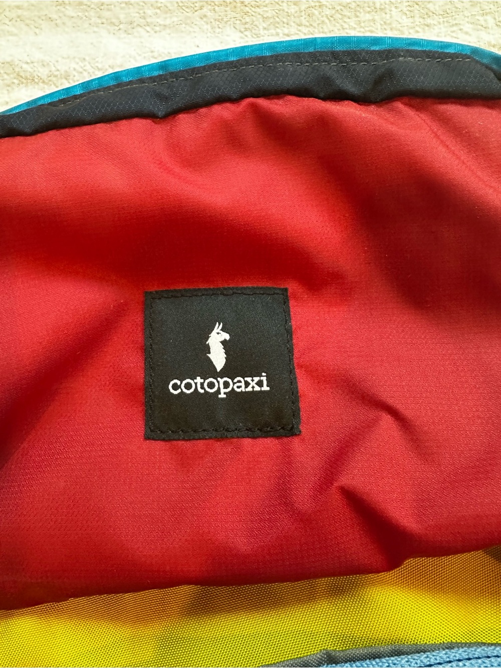 cotopaxi colorblock backpack in blue, red, and yellow - Picture 2 of 5